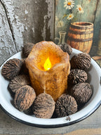25 Primitives Black Walnuts And Candle In Enamelware Bowl 7x5
